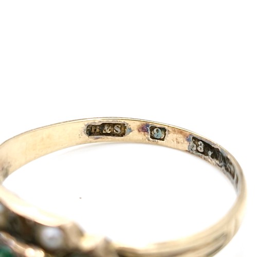 7 - A vintage turquoise and seed pearl ring set in nine carat gold (one pearl missing). Ring size - P. W... 