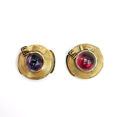 27 - A pair of 14 carat gold dress studs set with cabochon cut gem stones. Dimensions - 1.5cm diameter. T... 