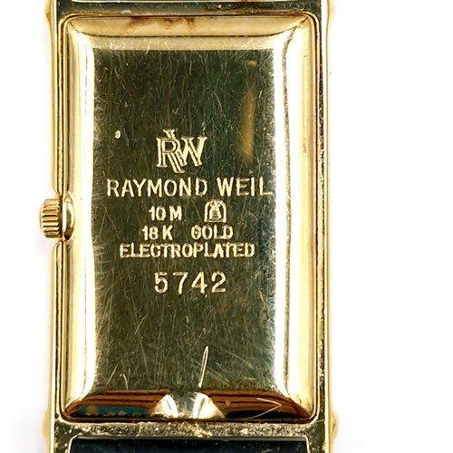 52 - Star Lot : A tank style wrist watch by  Raymond Weil Geneve. Watch with black face, gem set surround... 