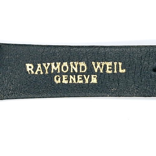 52 - Star Lot : A tank style wrist watch by  Raymond Weil Geneve. Watch with black face, gem set surround... 