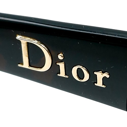 409 - Star Lot : A pair of Christian Dior sunglasses with faux tortoise shell frames, Christian Dior marke... 