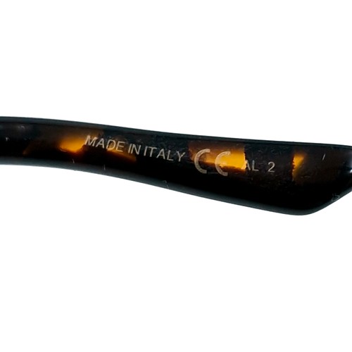409 - Star Lot : A pair of Christian Dior sunglasses with faux tortoise shell frames, Christian Dior marke... 