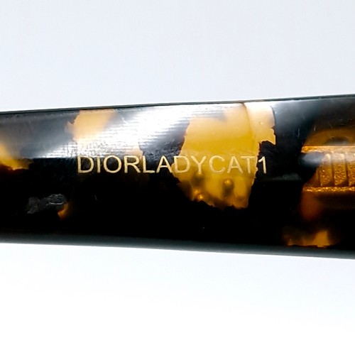 409 - Star Lot : A pair of Christian Dior sunglasses with faux tortoise shell frames, Christian Dior marke... 