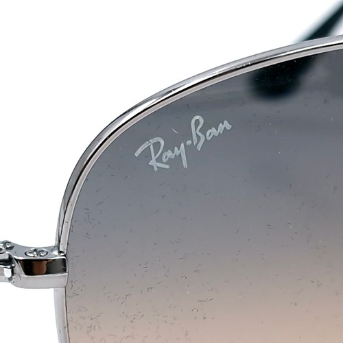 412 - A pair of Ray Ban aviator style metal framed sunglasses with detailing to frames. Lenses in good cle... 