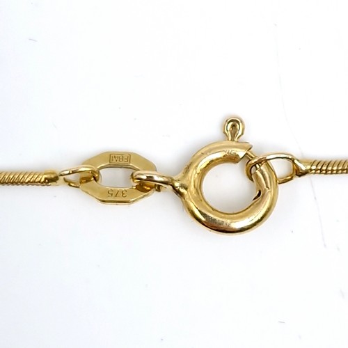 415 - Star Lot : A collection of items consisting of a nine carat gold (375) diamond pendant - Weight - 1.... 