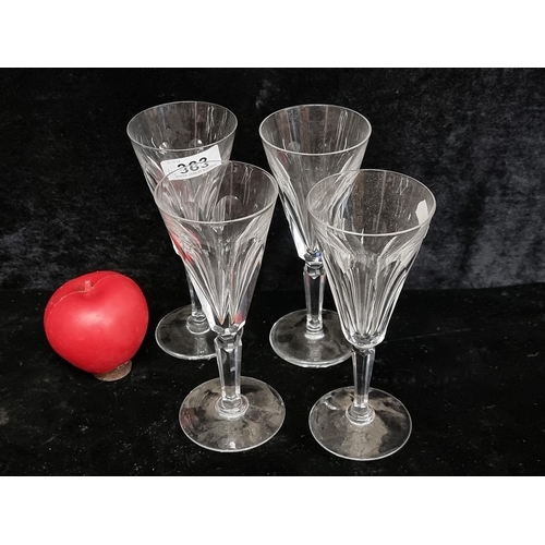 363 - A set of four Waterford Crystal champagne flutes glasses in the Sheila pattern. All in good conditio... 