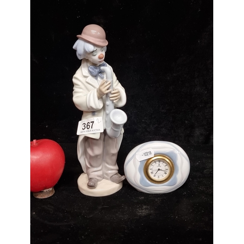 367 - Two Lladro porcelain items including a 1987 Daisa clown saxophonist figurine and a 1983 Daisa desk c... 