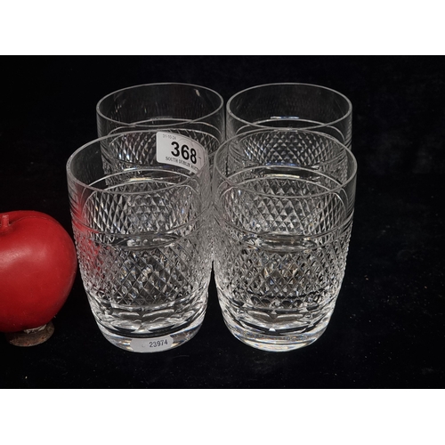 368 - A set of four large Waterford Crystal 8oz Whiskey tumbler glasses in the Cashel pattern. All in good... 