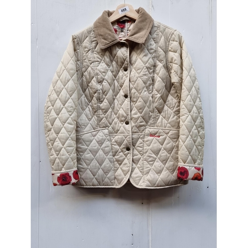 488 - A nice Barbour ladies quilted cream jacket featuring the country cottage print lining. Size UK 10.