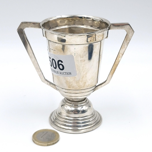 506 - Star lot : An Irish silver twin handled trophy. Made by Alwright & Marshall limited silver smiths. W... 