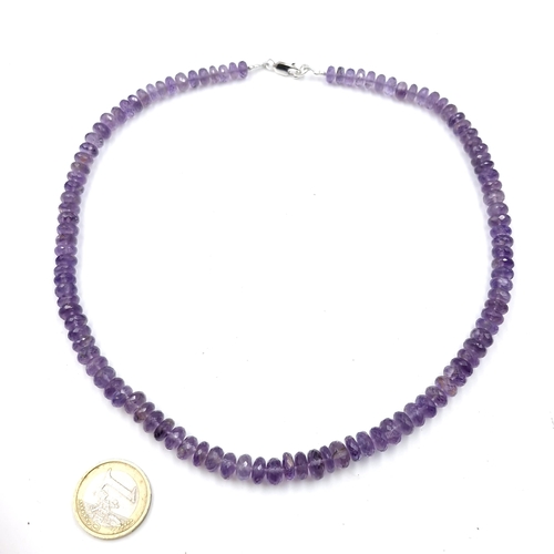 568 - A graduated 190cts faceted natural amethyst gemstone necklace with lobster clasp set in sterling sil... 