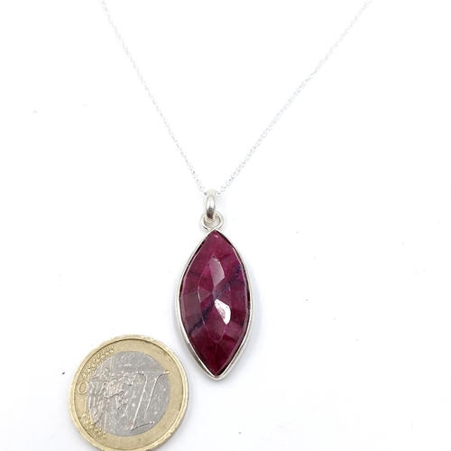 575 - A marquise shaped natural ruby gemstone pendant necklace set in sterling silver necklace and pendant... 