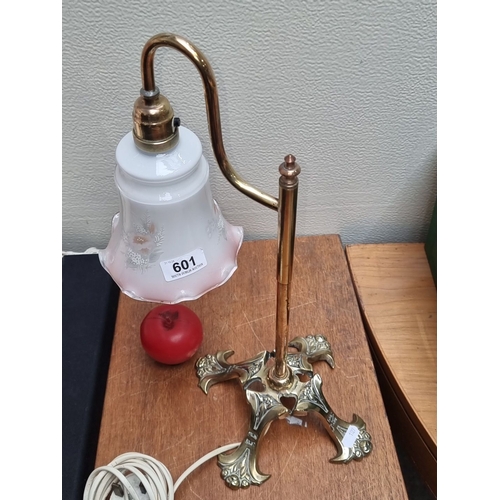 601 - Star Lot : Antique brass table lamp with frosted floral glass shade features an ornate base and deli... 