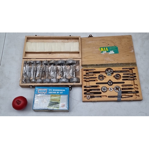 606 - Mixed woodworking tool set, including Rolson 5-piece Forstner bit set, tap and die set, and assorted... 