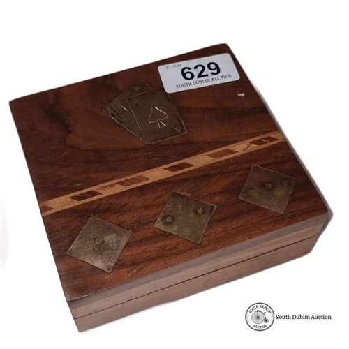 629 - Wooden decorative box with playing card suit inlays, containing wooden box Guinness-branded playing ... 