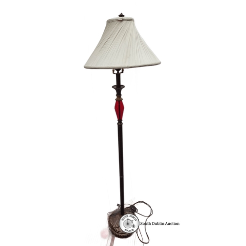 647 - Vintage floor lamp with pleated cream shade, red glass accent, and ornate base. Manufactured by Mart... 