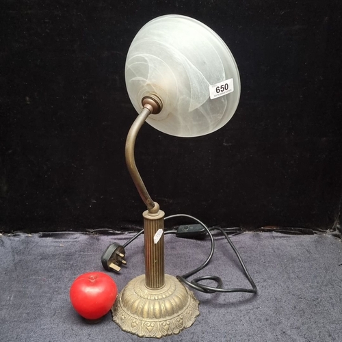 650 - Vintage brass table lamp with frosted glass shade, featuring a ribbed column and floral base design.... 