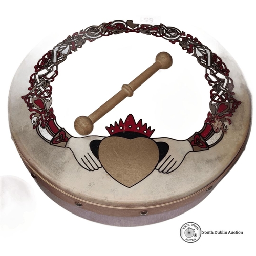 651 - Bodhrán with Celtic Claddagh motif, wooden frame, and beater.