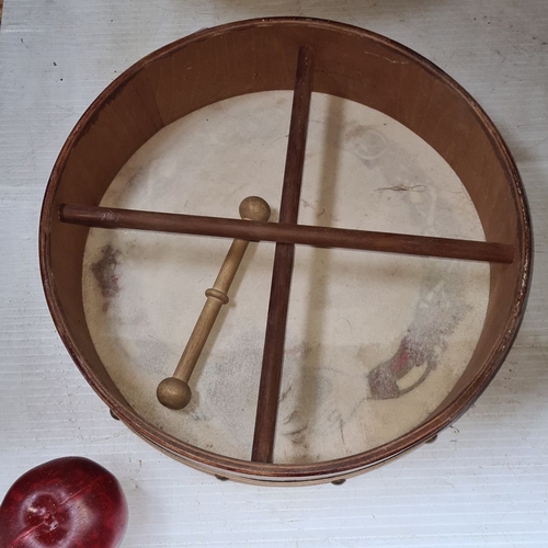 651 - Bodhrán with Celtic Claddagh motif, wooden frame, and beater.