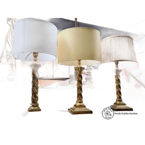 663 - Set of three matching brass table lamps with ornate Corinthian column design and spiral detailing, e... 