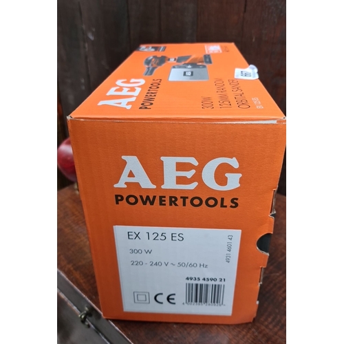 667 - AEG EX 125 ES 300W Random Orbital Sander. Model 125mm, boxed. Offers 220-240V, 50/60Hz power, includ... 