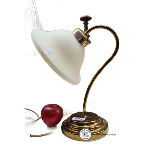 670 - Brass desk lamp with frosted glass shade, featuring an elegant curved design.