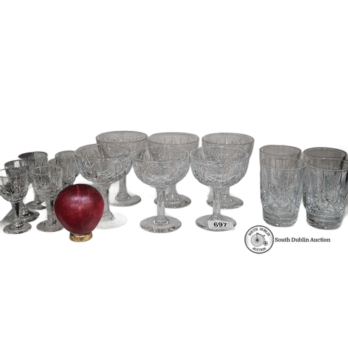 697 - Three sets of Crystal glassware set, featuring wine glasses, coupe glasses, and tumblers with intric... 