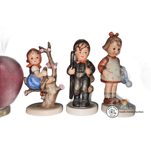 700 - Set of three Hummel figurines, hand-painted porcelain. Includes 