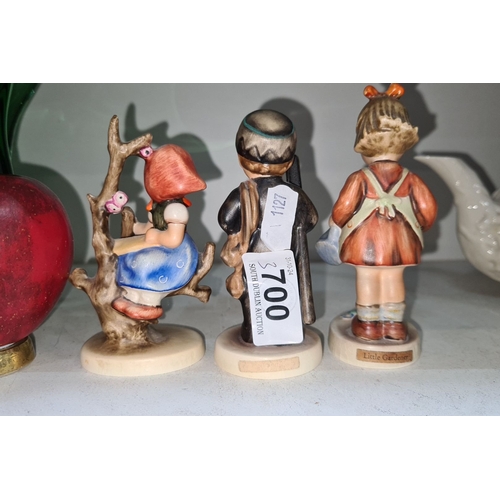 700 - Set of three Hummel figurines, hand-painted porcelain. Includes 