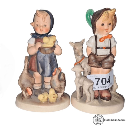 704 - Pair of Goebel porcelain figurines, hand-painted, depicting children with farm animals. Marked with ... 