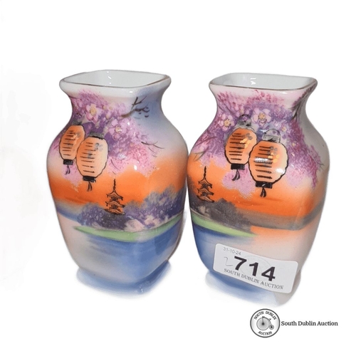 714 - Pair of Noritake vases, Japanese porcelain, featuring vibrant landscape scenes with lantern motifs. ... 