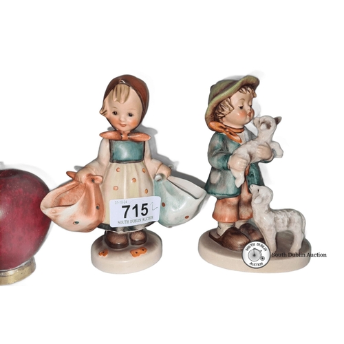 715 - A pair of Hummel figurines, West Germany, ceramic, featuring children with animals. Hand-painted wit... 