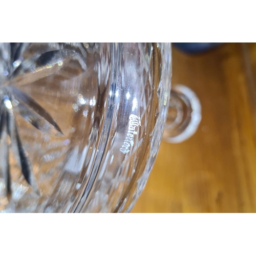 723 - Waterford crystal decanter featuring classic diamond-cut pattern with spherical stopper. Marked 