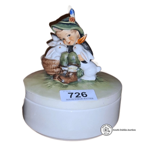 726 - Goebel W. Germany porcelain figurine box featuring a boy with rabbits. From the 20th century.