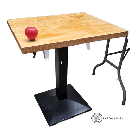 758 - Square commercial  table with light wood top and sturdy black pedestal base.