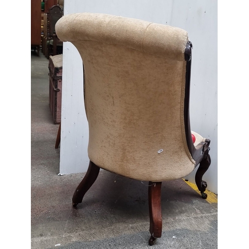 759 - Antique Carved mahogany slipper chair with tufted upholstery, featuring elegantly curved legs and cl... 