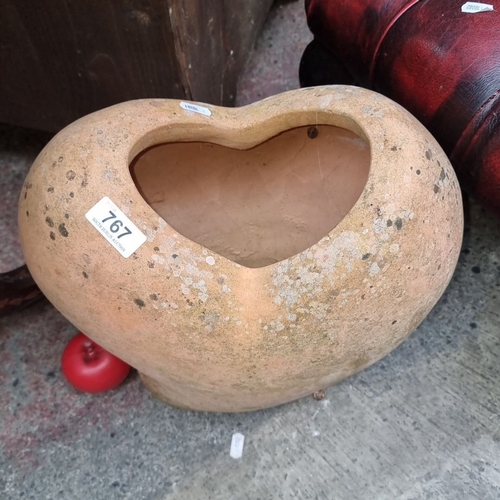 767 - Heart-shaped terracotta planter, rustic style. Earthy tones with natural patina.