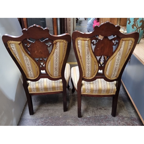 773 - Star Lot : Pair of Victorian matching side chairs with carved wood frames and elegant damask upholst... 