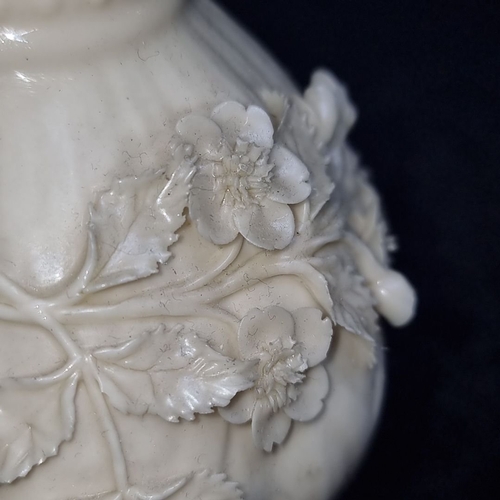 776 - Star Lot : A large black stamp Belleek porcelain vase, Co. Fermanagh, Ireland, features intricate fl... 