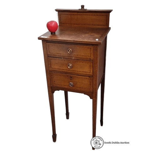 780 - Edwardian mahogany bedside cabinet with three drawers and brass handles. Great looking piece.