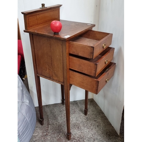 780 - Edwardian mahogany bedside cabinet with three drawers and brass handles. Great looking piece.