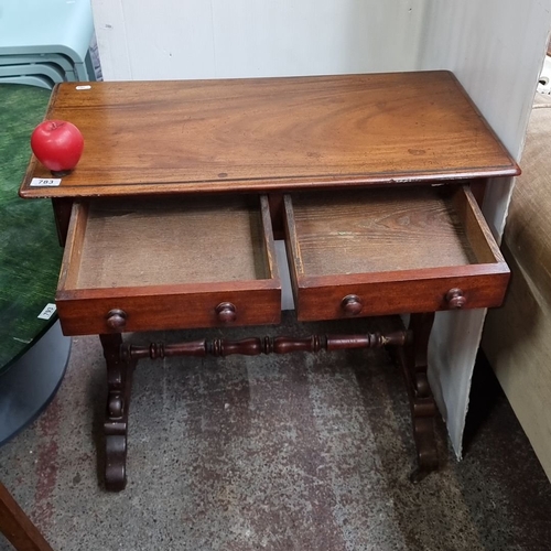 783 - Star lot : Late Victorian side table in polished mahogany with two drawers and decorative stretcher.