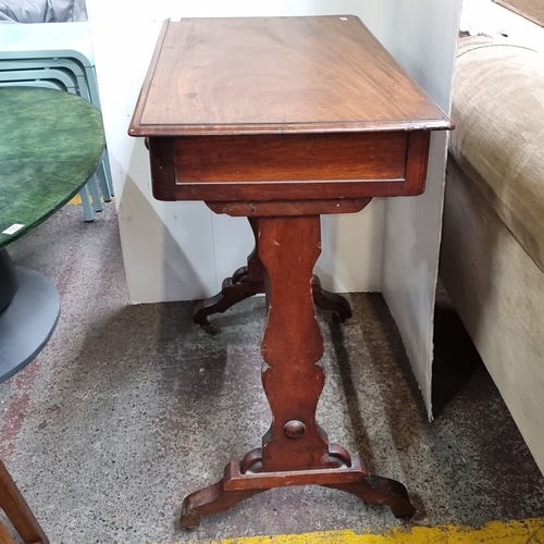 783 - Star lot : Late Victorian side table in polished mahogany with two drawers and decorative stretcher.