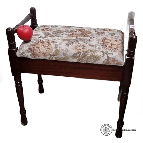 784 - Upholstered storage footstool, with turned wooden legs and floral tapestry fabric. Hinged lid reveal... 