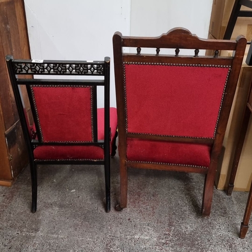 796 - Two Victorian parlor chairs with red upholstery and carved wood details. Includes matching footstool... 