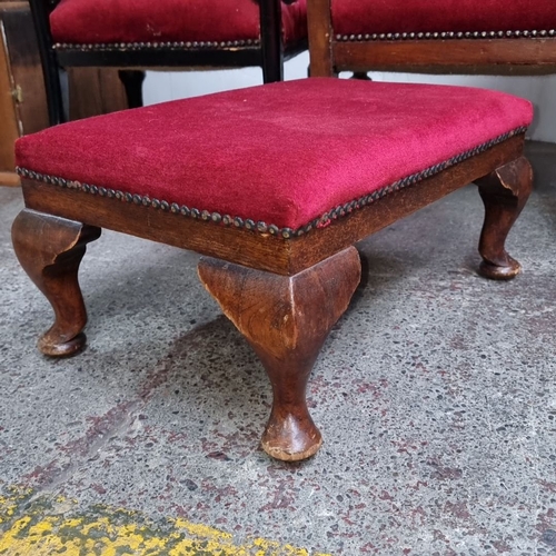 796 - Two Victorian parlor chairs with red upholstery and carved wood details. Includes matching footstool... 