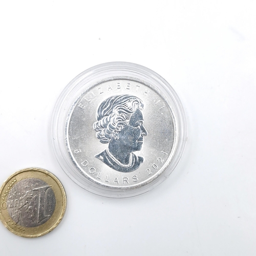 68 - A 0.9999 encapsulated QEII Canadian one ounce silver coin. Silver content - 99% proof.