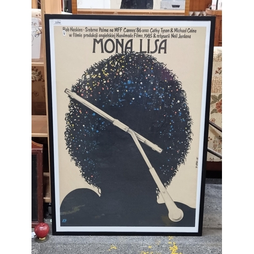 1250 - A large print of a Polish Film Poster featuring '1980s Mona Lisa'. Housed in a smart black frame beh... 