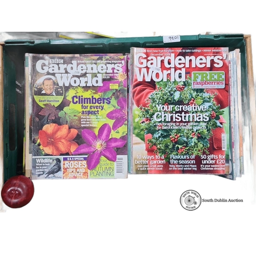 1076 - A large box of gardener world magazines.