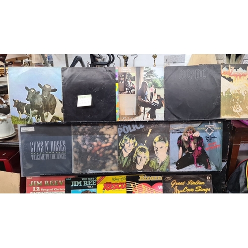 1084 - Collection of 15 vinyl records, featuring artists Pink Floyd, AC/DC, Led Zeppelin, The Police, Guns ... 